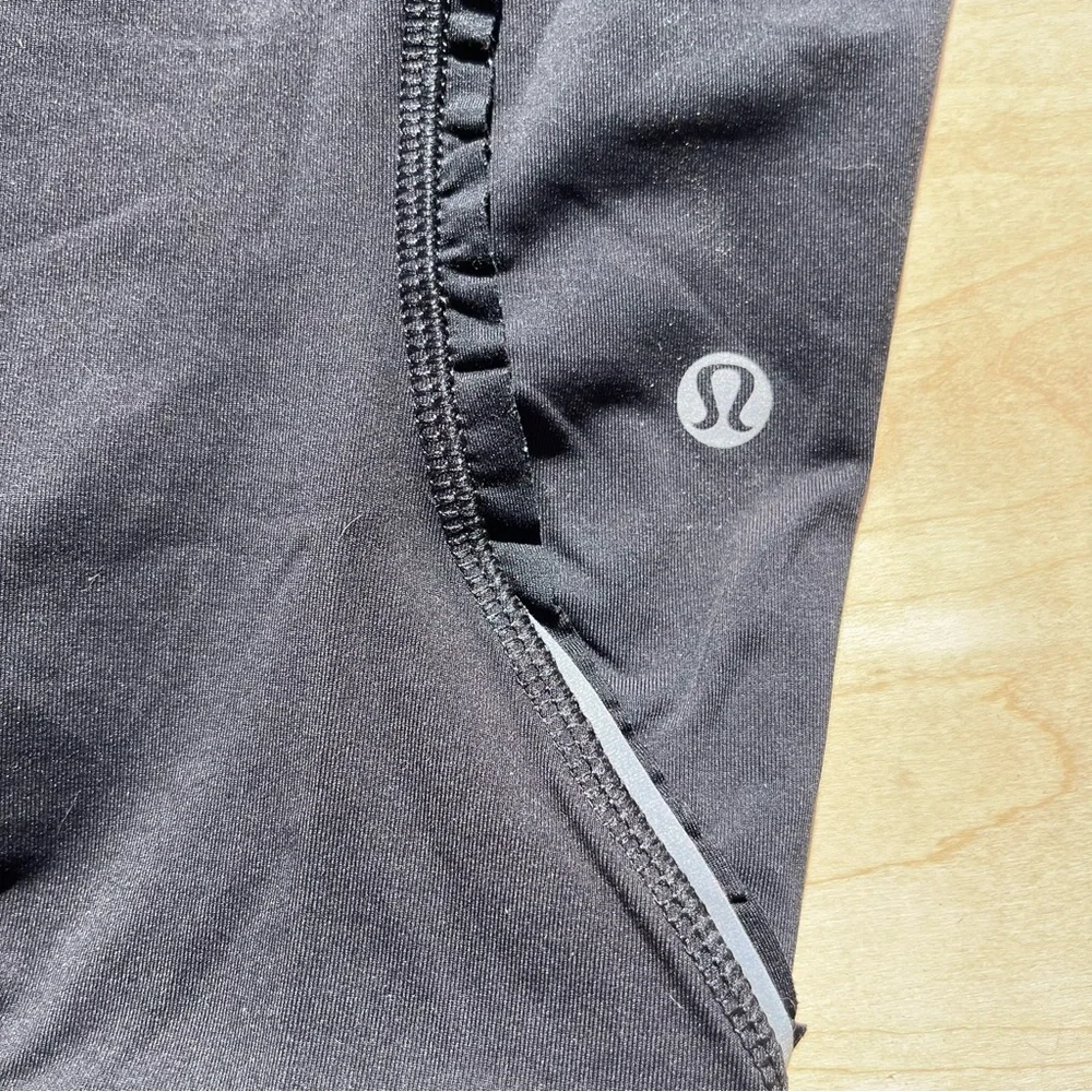 Lululemon Run Fast Free Crop Sz 8 Black, Ruffle Reflective Power Luxtreme - Picture 9 of 14